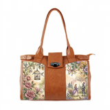 A brown leather-style tote bag with panels featuring a fairytale illustration of a princess and knight in a garden with roses and birds in cages.