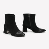 Black suede signature cap-toe ankle boots with sturdy block heel and metallic zipper detail.