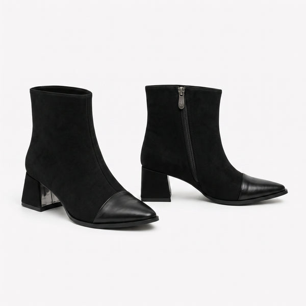 Black suede signature cap-toe ankle boots with sturdy block heel and metallic zipper detail.