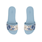 Pair of light blue ECADRA Blue Drift Slides featuring a canvas strap with a vintage blue rose and botanical floral print.