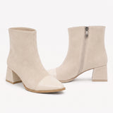 Off-white beige suede booties with smooth faux leather cap toe and mid block heel.