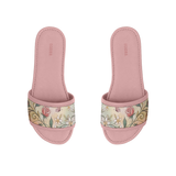 Pair of pink ECADRA Rose Drift Slides featuring a canvas strap with a warm golden vintage floral, vine, and butterfly print.