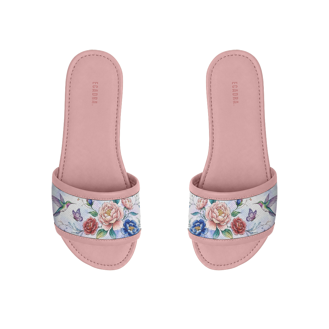 Pair of pink ECADRA Rose Drift Slides featuring a canvas strap with a vibrant hummingbird, butterfly, and floral print.