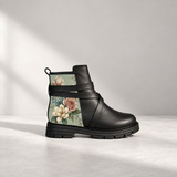 Street Mode black ankle boot with vintage floral panel, single side view on studio background