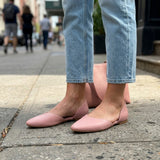 Overhead view of rose open-side Wink Flats worn with jeans on a city sidewalk | ECADRA