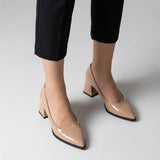 Woman wearing beige gloss pointed pumps with low 5 cm flared block heel, front view — ECADRA
