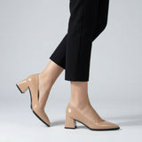 Woman walking in beige gloss pointed pumps with low 5 cm flared block heel, side view — ECADRA