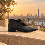 Black on Black pointed-toe ankle boots with three coiled straps — three-quarter view — ECADRA