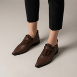 Brown Coil Strap ankle boots on foot — worn, front view — pointed toe, three coiled straps — ECADRA
