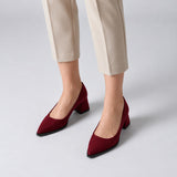 Burgundy suede pointed pump with low 5 cm flared block heel, worn on model, front — ECADRA