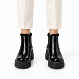 Black Patent Teddy Puffer Boots on a model – هاف بوت فرو لامع – ECADRA (2)