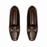 Chocolate Chain Loafers – Step Into Your Power – glossy chocolate brown loafers with gold chain, top view – ECADRA