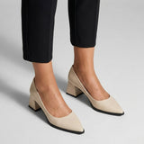 Woman wearing cream matte pointed pumps with low 5 cm flared block heel, front view — ECADRA