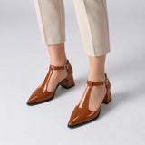 Havana gloss T-strap heels with wide strap, silver buckle and 5 cm flared heel, worn on model, front — ECADRA