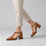Havana gloss T-strap heels with wide strap, silver buckle and 5 cm flared heel, worn on model, walking — ECADRA