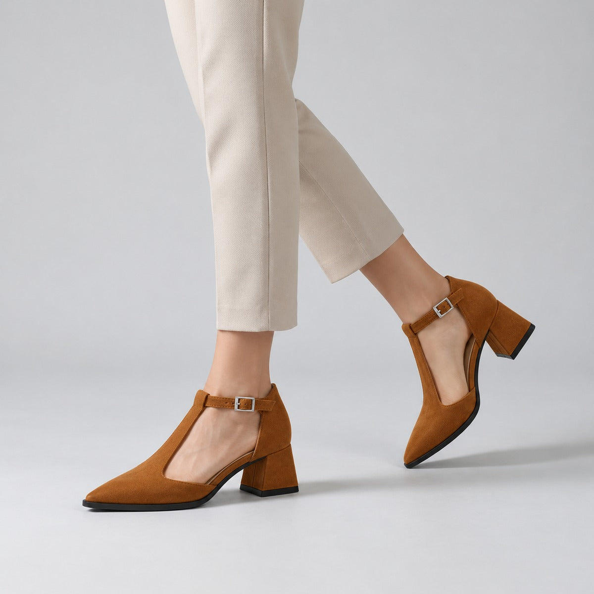 Havana suede T-strap heels with wide strap, silver buckle and 5 cm flared heel, worn on model, walking — ECADRA