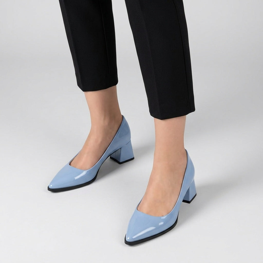 Woman wearing light blue gloss pointed pumps with low 5 cm flared block heel, front view — ECADRA