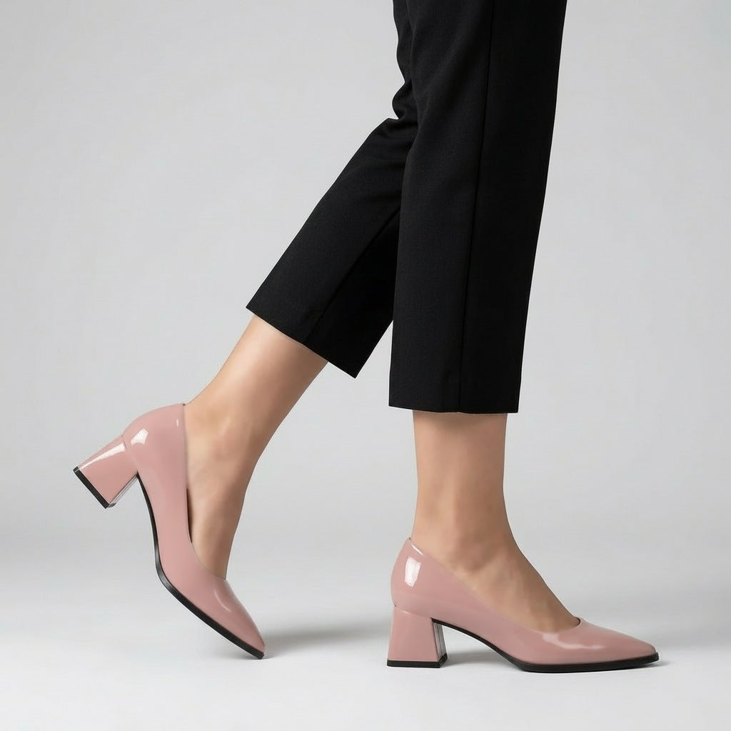 Woman walking in rose gloss pointed pumps with low 5 cm flared block heel, side view — ECADRA