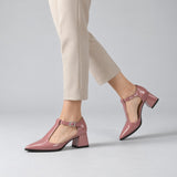 Rose gloss T-strap heels with wide strap, silver buckle and 5 cm flared heel, worn on model, walking — ECADRA