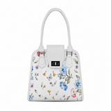 Front view of ECADRA White Metropolitan Charm Bag with botanical small wildflower and butterfly print and silver turn-lock clasp.