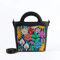 Black Top Handle Handbag Standing Flowers